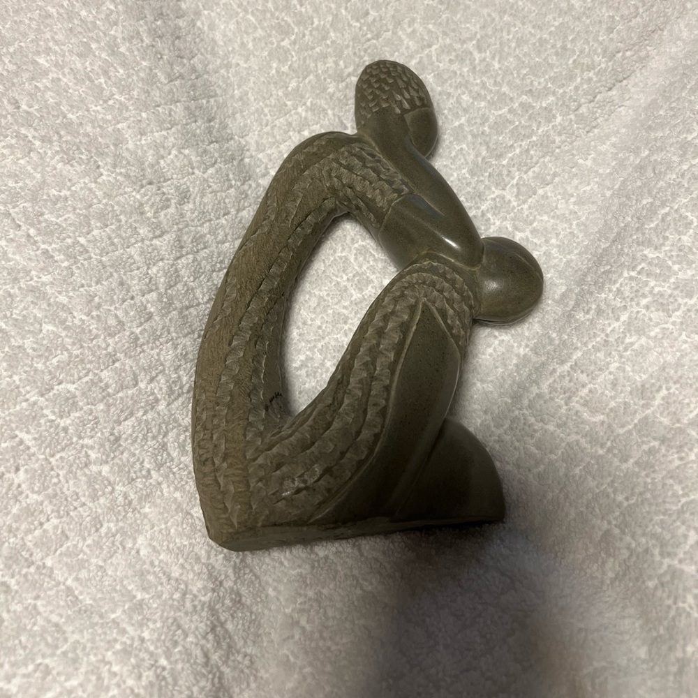 Vintage carved green soapstone “pondering” person signed by Osner